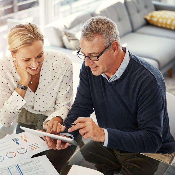 A financial advisor assists a Patelco member with retirement planning.