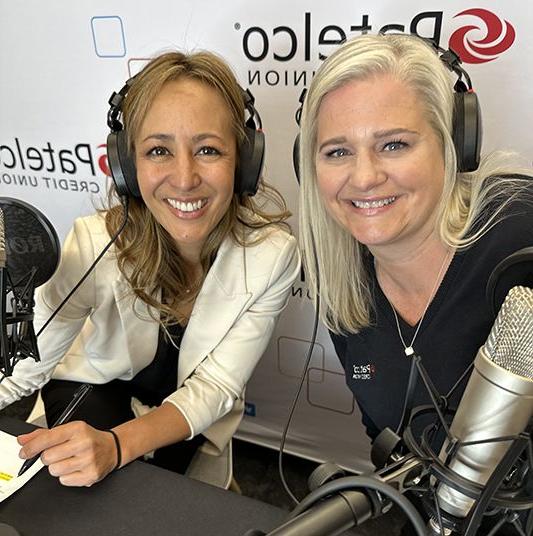 Patelco employees Michele Enriquez and Jennifer Mink at the podcast desk